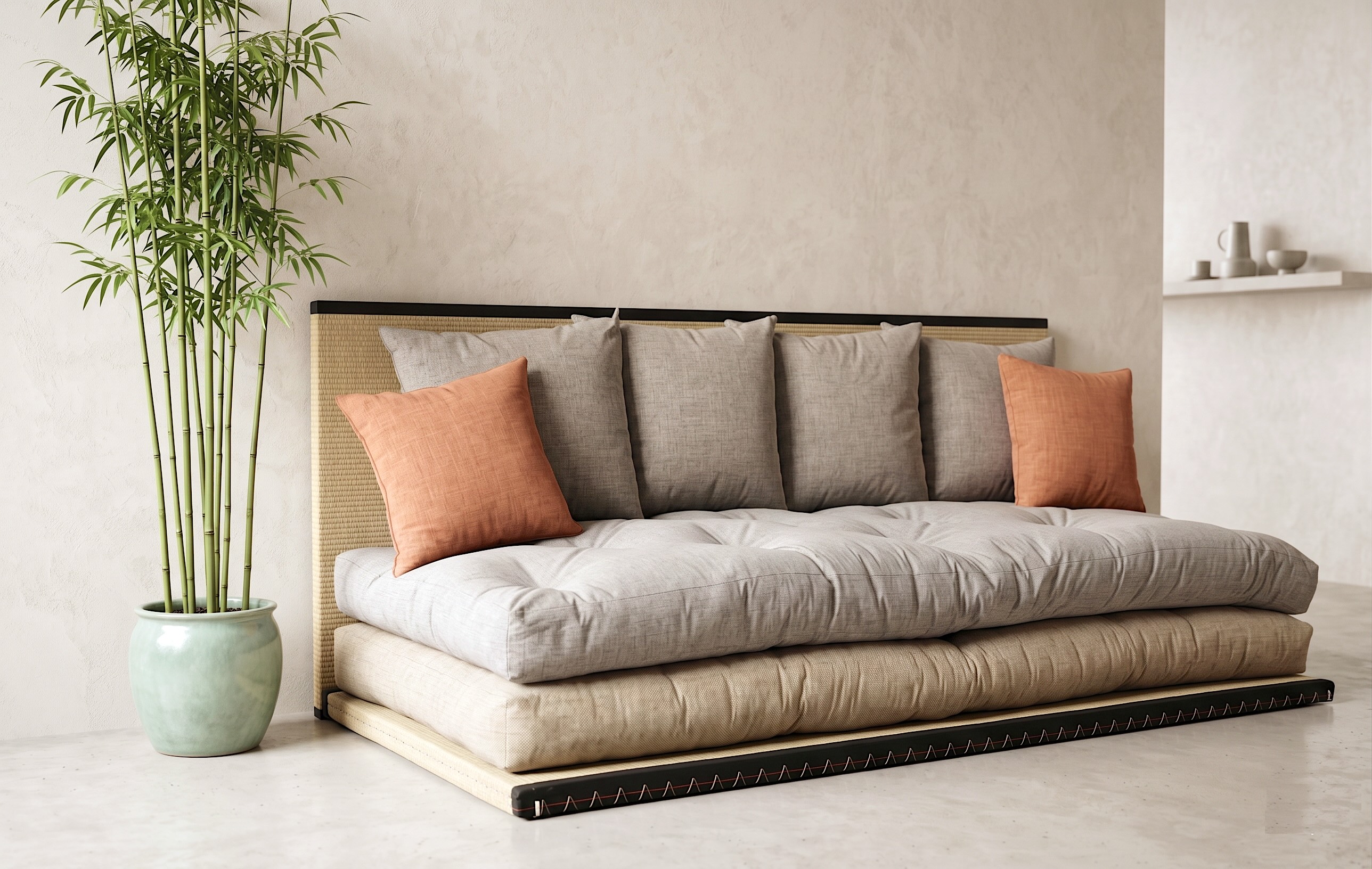 Futon-Tatami-Sofa – japanisches Schlafsofa mit Futon und Tatami-Sockel im Wohnraum